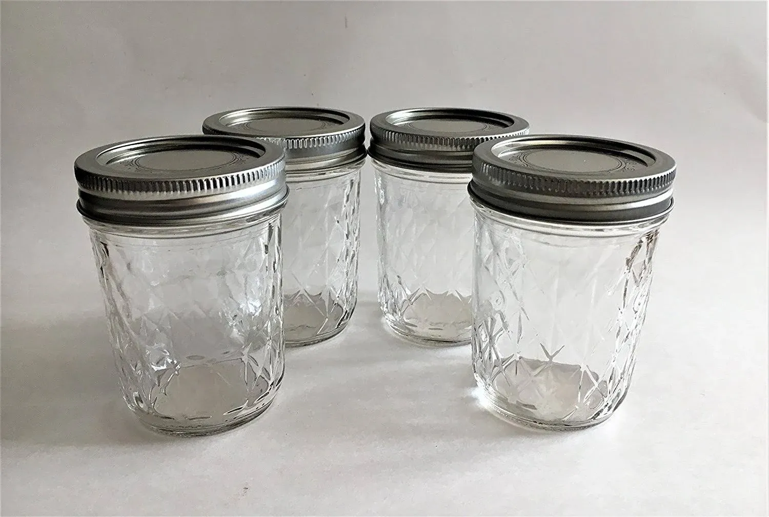 Regular Mouth Quilted Crystal Jelly Mason Jars 8 oz - (4 Pack) - Ball 8-Ounce Quilted Crystal Jelly Jars with Lids and Bands - For Canning, Fermenting, Pickling, Freezing - Glass jar, Microwave & Dishwasher Safe